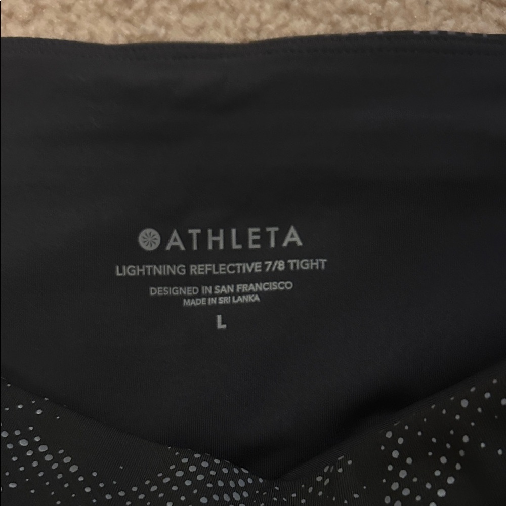 Athleta Black Lightning Reflective 7/8 Tight - Picture 2 of 2